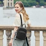 PORRASSO Modieuze mini rugzak voor meisjes met pompon van PU leer voor reizen, dating, winkelen, zwart., S, Praktisch : Amazon.nl: Kleding, schoenen & ...